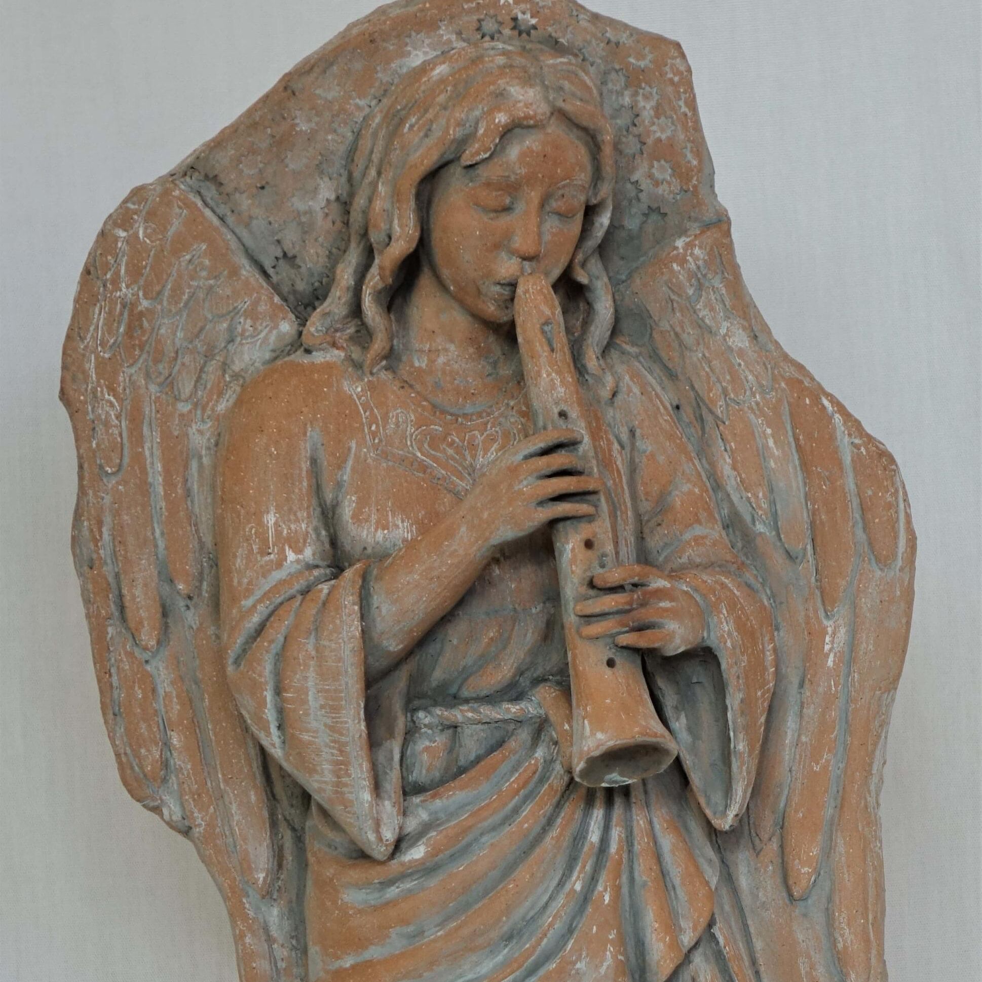 Angel-with-flute-scaled