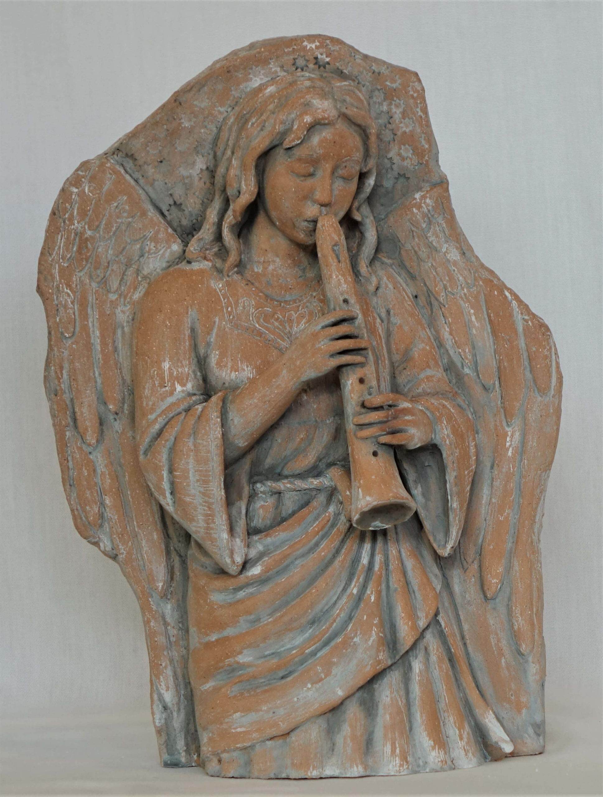 Angel-with-flute-scaled