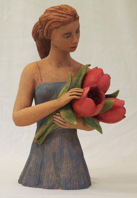 Girl with big tulips